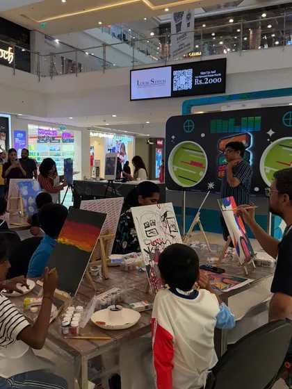Another shot from our pop-up painting station in a mall. It was a beautiful session filled with colors, laughter, and spontaneous creativity.
