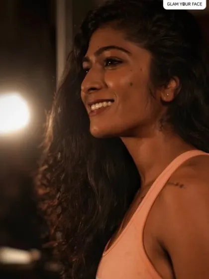 A profile shot from the gym shoot, highlighting the natural-looking, glowing skin I created for the model.