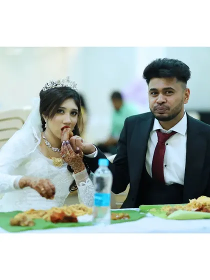 A beautiful moment from a Muslim wedding, where the couple enjoys their meal. We respect and cater to all traditions.