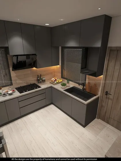 A high-angle view of the grey kitchen, showing the full extent of the cabinetry and the clean, uncluttered floor space.