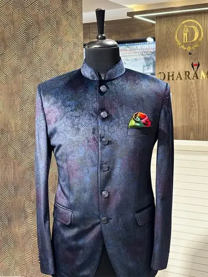 Another angle of the navy floral bandhgala, set against a textured wall in my store. This highlights the rich colors and intricate design of the fabric.
