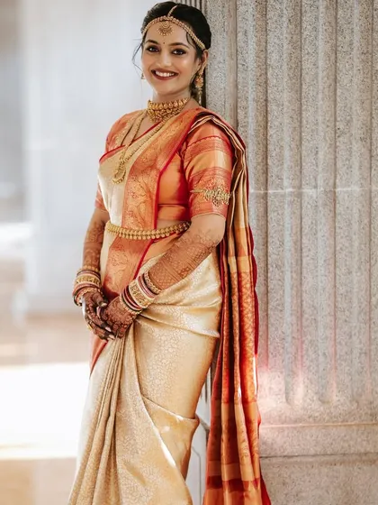 The bride's smile lights up the frame in this classic portrait.