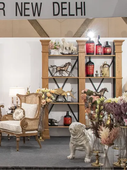 This corner of my exhibition booth highlights a classic armchair and an elegant wooden bookshelf. I was thrilled to share these designs with the visitors in Kanpur.