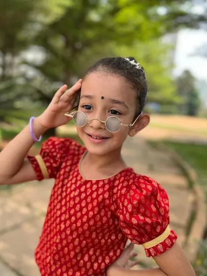 Another shot of this adorable performer, full of personality and charm. We encourage our kids to be themselves and have fun while they learn.