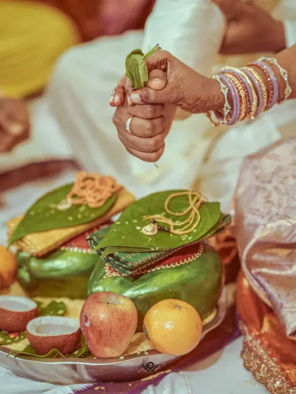A close-up of the offerings and rituals that are central to a Hindu wedding, highlighting the details and symbolism of the ceremony.