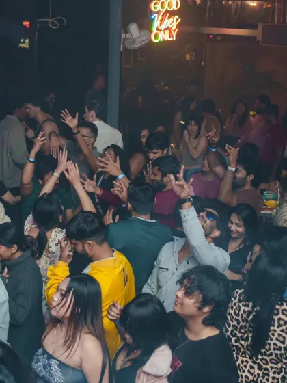 A wide shot of the packed dance floor.