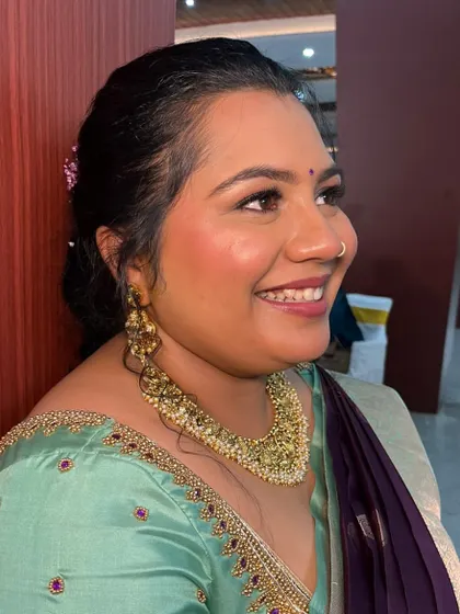 A happy, smiling bride. This unedited picture shows how the makeup looks natural and radiant, without appearing heavy or cakey.