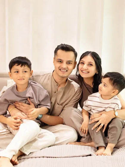 A beautiful, warm-toned family portrait taken in our studio. We can accommodate multiple generations to create a complete family picture.