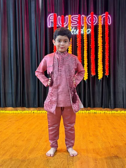 Our little performers dressed up and ready for their end-of-batch video shoot. We love seeing their confidence shine through.