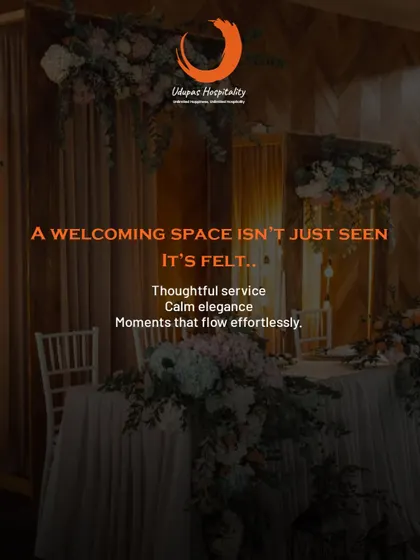 A welcoming space is not just seen, it's felt. This image captures the essence of our hospitality with an elegantly set table adorned with flowers, promising thoughtful service and moments that flow effortlessly.
