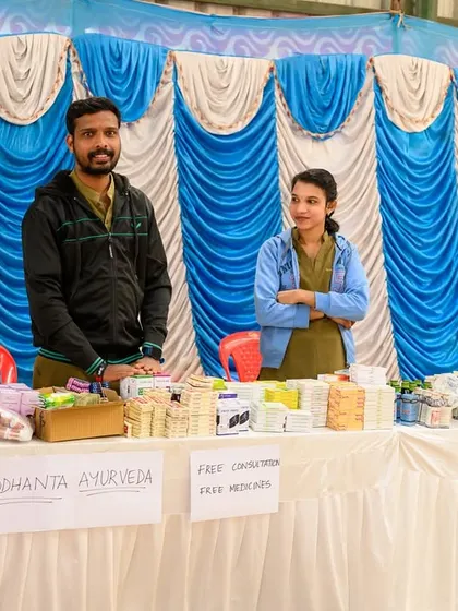 My team at the Siddhanta Ayurveda booth during the health camp, ready to provide consultations and free medicines to the community.