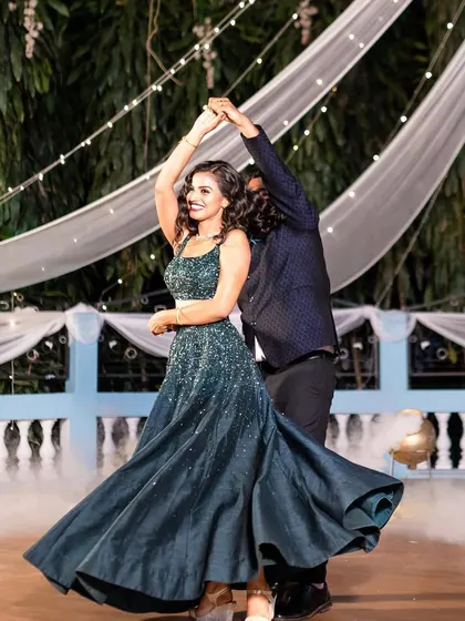 A beautiful spin during a reception dance, with the bride's dress fanning out for a gorgeous visual.