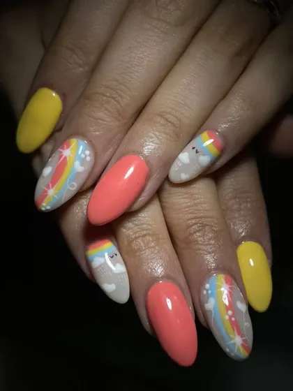 These nails are just too cute. The design includes hand-painted rainbows, clouds, and heart-shaped balloons for a super adorable summer look.