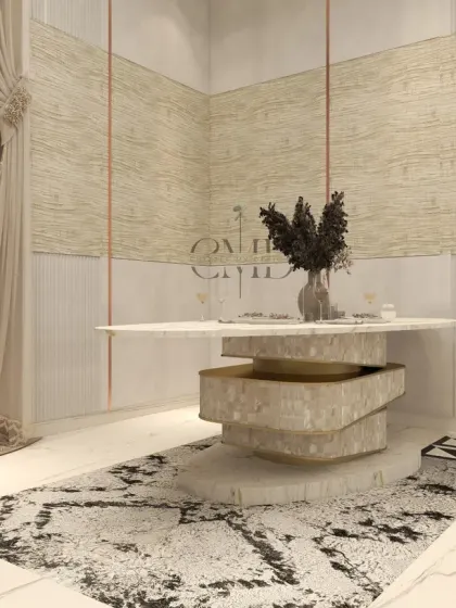 A stunning sculptural dining table with a mother-of-pearl inlay base serves as a functional piece of art in this elegant dining space.