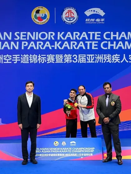 On the podium during the medal ceremony for the Asian Para-Karate Championship. We are committed to providing an inclusive platform for all athletes.
