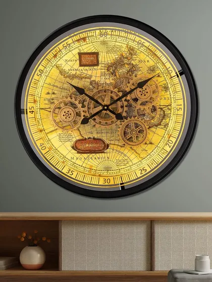 Our Timeless Tradition wall clock is a luxury designer piece with a moving gear mechanism and a built-in light that can be operated by remote. The vintage map background adds a classic, elegant touch.