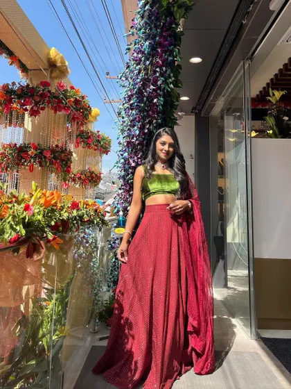 A full-length shot outside the beautifully decorated Bhima Jewellers showroom.