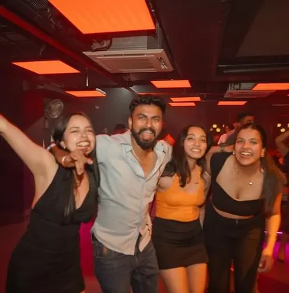 A group of friends enjoying the party.