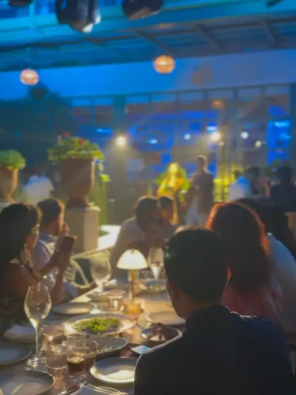 Another perspective of the live band performance, showing the intimate yet lively setting of our courtyard.