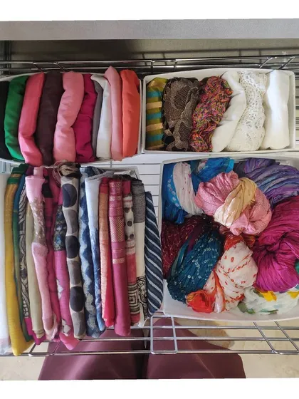 A look inside a walk-in closet drawer where we organized scarves and dupattas using simple drawer dividers.