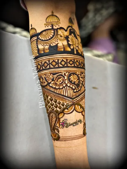 A close up of a beautiful arm band design. The details of the elephant and the surrounding patterns are crisp and clean.