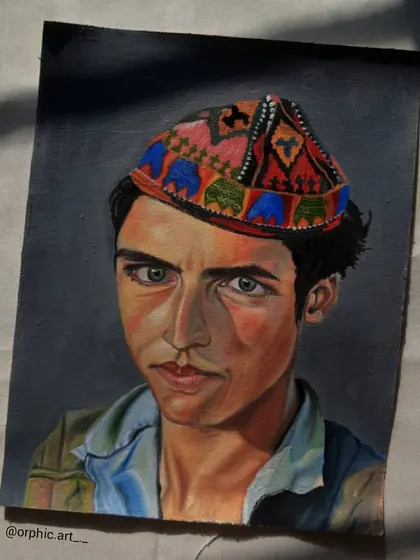 This is an oil portrait of a man wearing a traditional embroidered cap. I was drawn to the intricate patterns and colors of the cap and the subject's intense gaze.