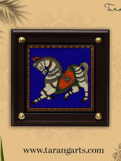This glass painting of a royal horse captures its strength and grace. The intricate ornamentation and vibrant blue background make it a striking piece of art, perfect for adding a touch of regality to your decor.