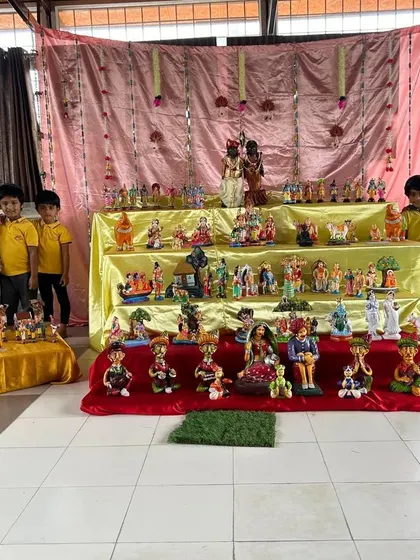 A 'Golu' display for Dussehra, showcasing various dolls and figurines. This is a cultural geography lesson, teaching children about traditions and stories from different parts of India.