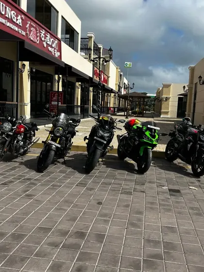 Bikes parked along our clean, wide walkways. The open layout gives riders plenty of space to gather and admire the machines.