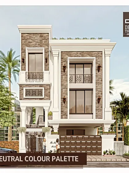 A neutral color palette, as shown in this classically inspired home with stone cladding, creates a calm, subtle, and sophisticated appearance.