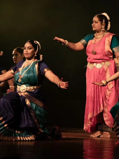 Me, guiding my students on stage as part of the choreography.