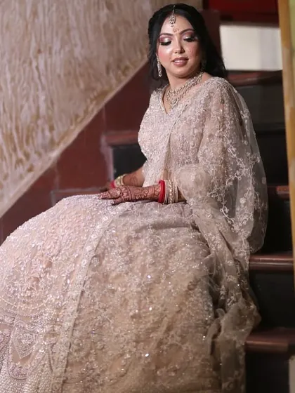 A final shot from the staircase series, capturing the bride in a moment of quiet beauty.