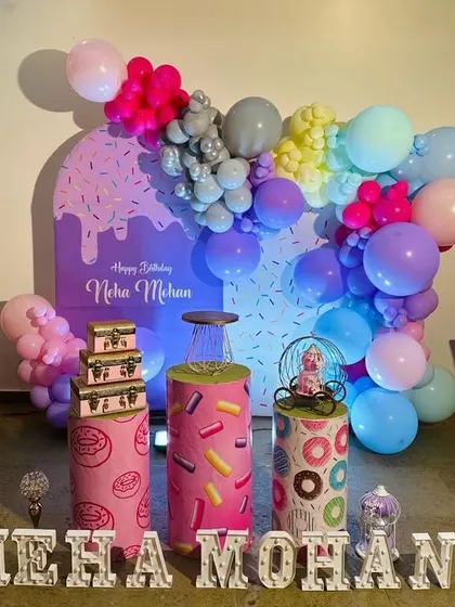 An angled shot of the donut-themed party, showing the vibrant colors and fun props.