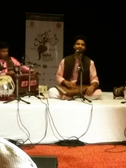 A view from the audience at the Delhi International Arts Festival concert. It captures the atmosphere of the live performance as we present traditional Indian classical music.