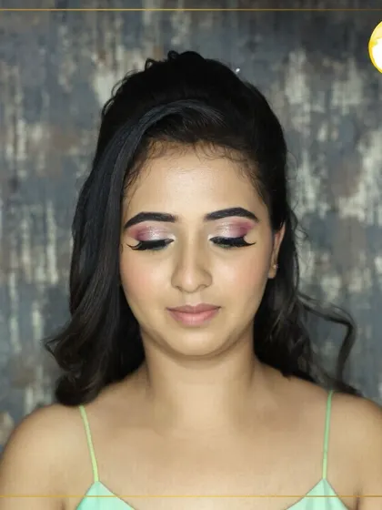 A classic glam look with winged eyeliner and soft pink eyeshadow. This is a versatile style that you can learn to adapt for many different occasions, from daytime parties to evening functions.