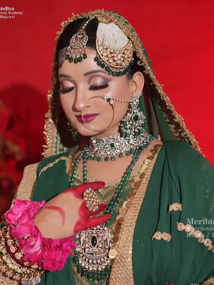 A graceful portrait focusing on the side profile, highlighting the 'jhoomar' and the neatness of the hair.