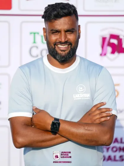 A smiling and confident coach from Lakshyan Academy of Sports. I partner with academies that share my passion for youth development.
