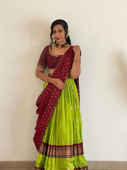 A full length view showing the beautiful flow of the half saree skirt. Renting allows you to wear gorgeous, high quality traditional outfits like this for a fraction of the price.
