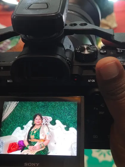 As part of our end-to-end service, we offer professional photography. This behind-the-scenes shot shows our team capturing moments during a baby shower, ensuring every detail of your event is documented.