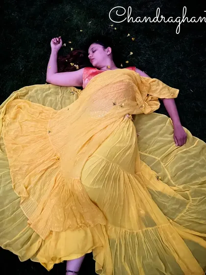 Our artistic representation of Chandraghanta. Lying on the earth, the dancer embodies a serene power, connecting to the fire element of the solar plexus chakra.