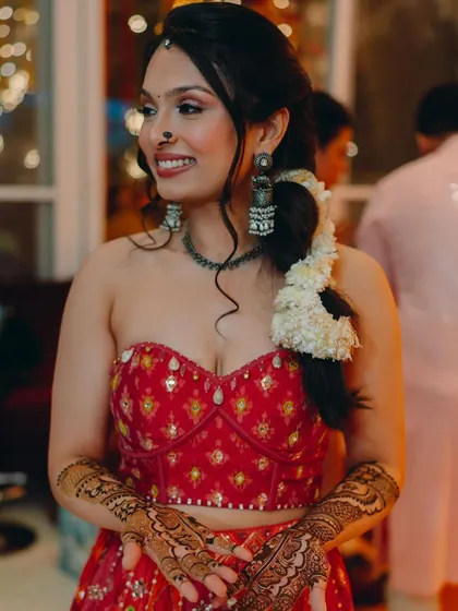 More shots from the same beautiful Mehendi function, capturing the bride's joy and the festive atmosphere.