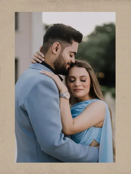 An intimate and tender moment from Tushar and Shriya's pre-wedding shoot, where he gently kisses her forehead.