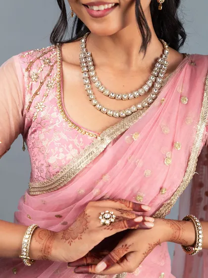 This client truly felt like a princess in her custom pink lehenga, and her joy is what makes my work so rewarding.