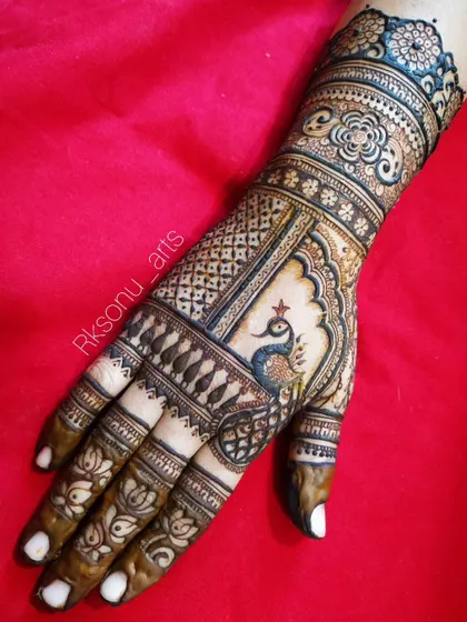 Here is a collection of my intricate bridal and engagement designs. Each one features a unique combination of traditional motifs like elephants, peacocks, lotuses, and personalized elements for the bride.