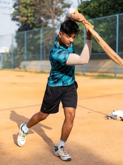 Practicing my batting form. The discipline from sports translates directly to the discipline needed for fitness.