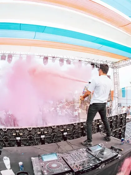 It's not a Holi party without some color. Here I am, joining in the fun and spraying the crowd with a color cannon from the stage.