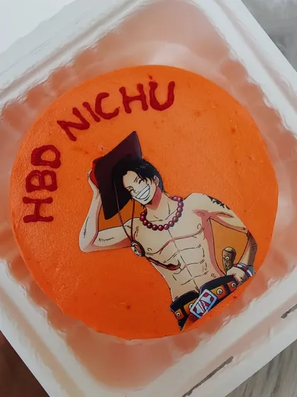 Another One Piece bento cake, this time featuring Ace. Perfect for celebrating a birthday with a favorite anime character.