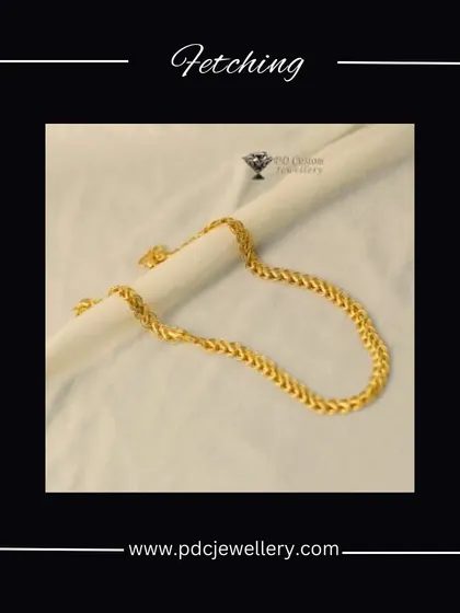 A fetching 22kt hallmark gold chain with a classic wheat link design. This type of chain is known for its durability and timeless appeal, making it a perfect foundation for any man's jewellery collection.