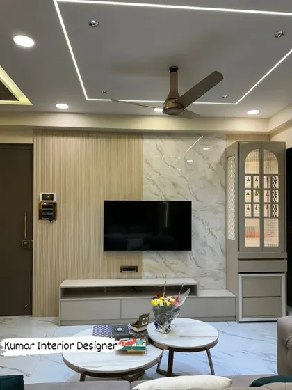 The TV and pooja unit combination in the finished flat, demonstrating how we integrate different functional elements into a cohesive design.