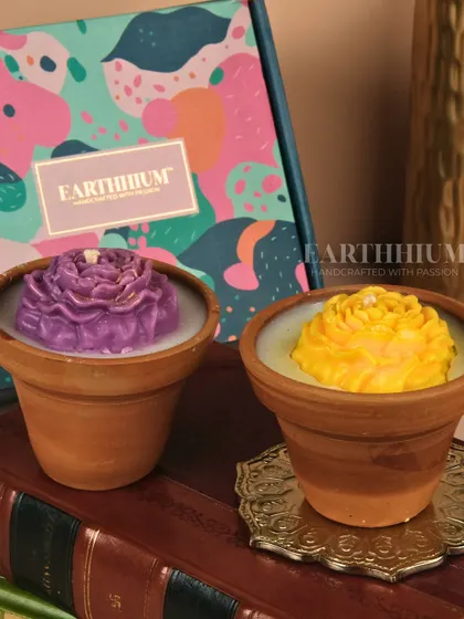 Another color combination from my floral terracotta pot candle set. The purple and yellow flowers create a cheerful and vibrant pair.